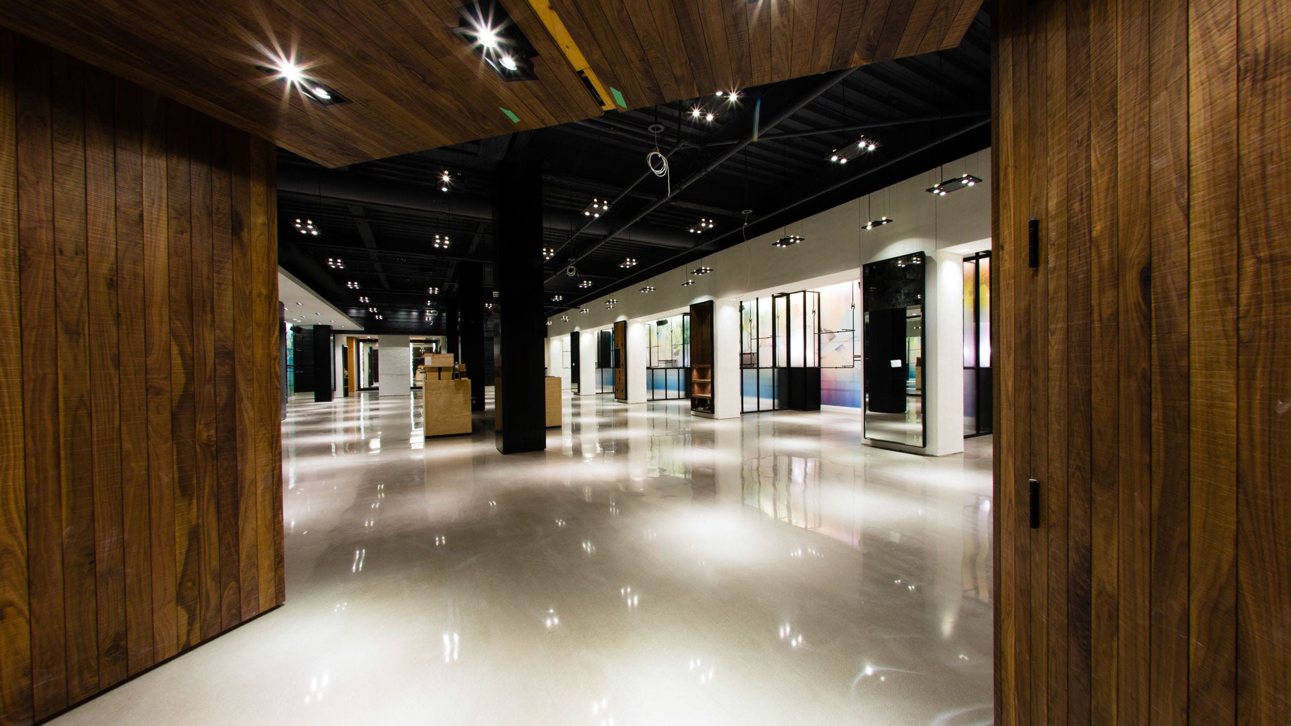 TTM Finishes Inc., Installation of Ardex PCT polished concrete topping at Aritzia store at Lime Ridge Mall in Hamilton, Ontario. Completion of grinding and polishing process on Ardex PCT floor.